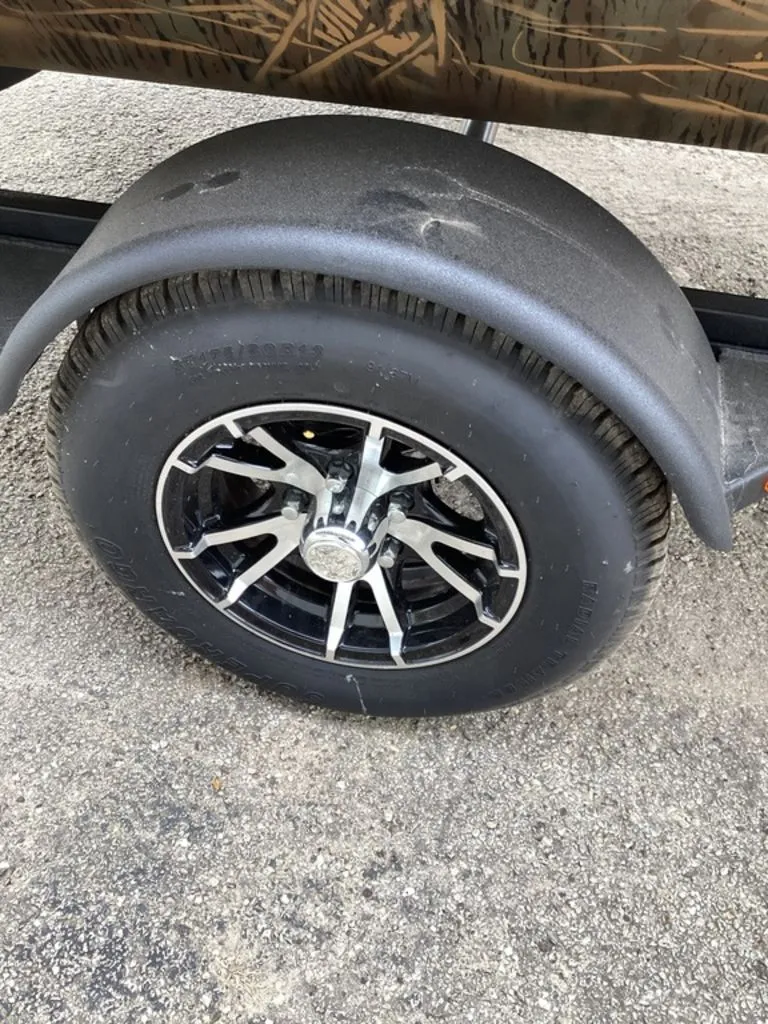 Slide: The Image of Close-up of a 2026 G3 Sportsman 1710 tire. - 12