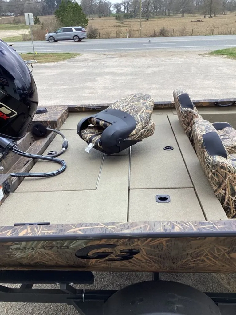 Slide: The Image of G3 Sportsman 1710 boat, 2026 model, featuring camouflage seats. - 14