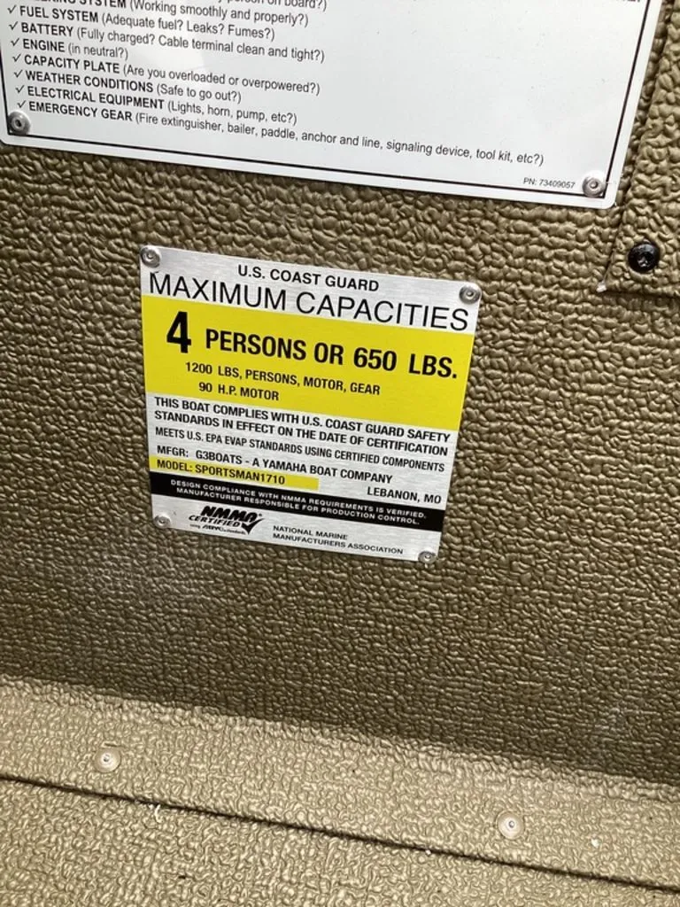 Slide: The Image of US Coast Guard capacity sign on G3 Sportsman 1710 boat. - 30
