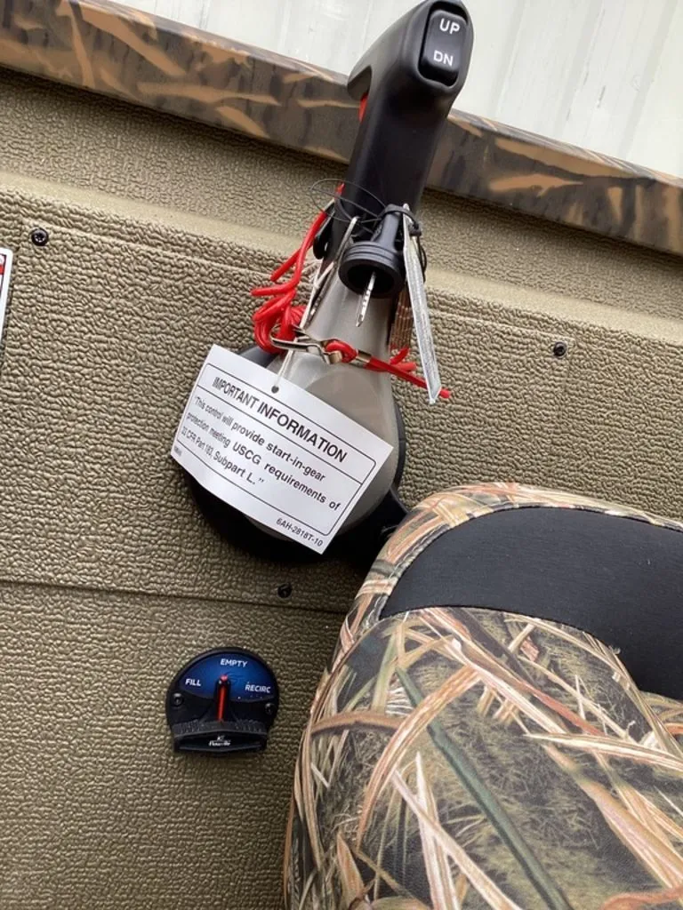 Slide: The Image of Close-up of control lever in G3 Sportsman 1710 boat, model year 2026. - 31