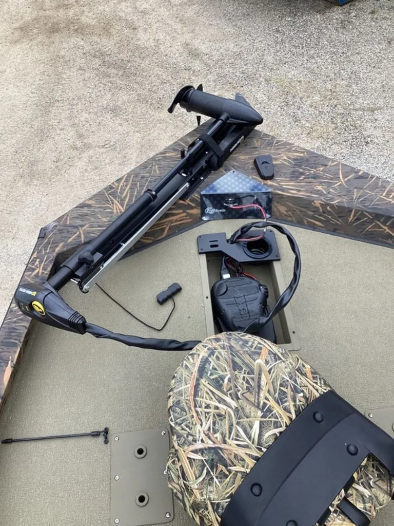 Slide: The Image of G3 Sportsman 1710 boat with camouflage pattern and equipment, year 2026. - 37