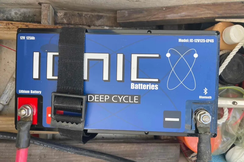Slide: The Image of 12V Ionic deep cycle lithium battery on 1998 Maine Cat Catamaran. - 10