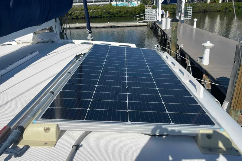 Slide: The Image of Solar panel on 1998 Maine Cat Catamaran deck, docked at marina. - 23