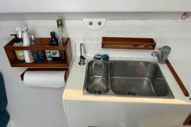 Slide: The Image of Stainless steel sink with faucet on 1998 Maine Cat Catamaran. - 47