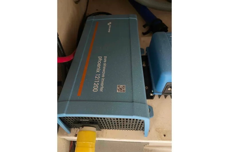 Slide: The Image of Victron Energy Phoenix Smart Charger in 1998 Maine Cat Catamaran. - 54