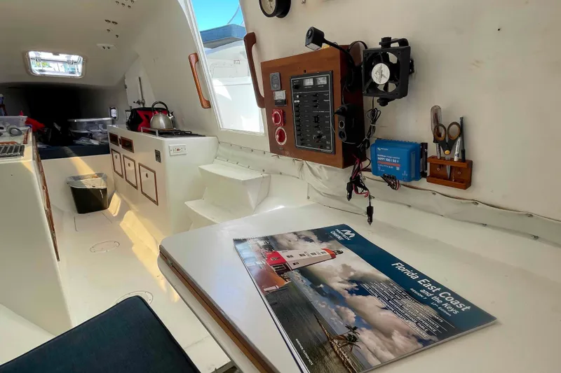 Slide: The Image of NAC-3 autopilot computer in 1998 Maine Cat Catamaran's control panel. - 56