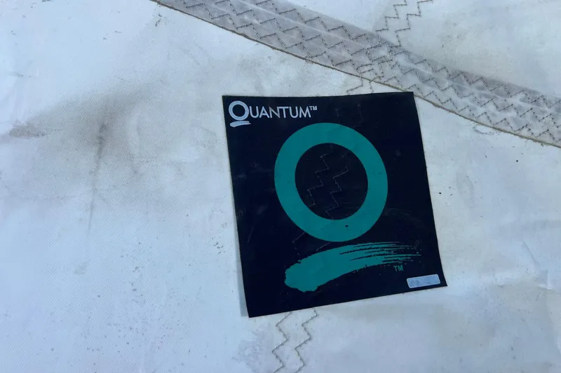 Slide: The Image of Sailing catamaran with raised sail against a clear sky, Maine Cat 1998 model. - 73