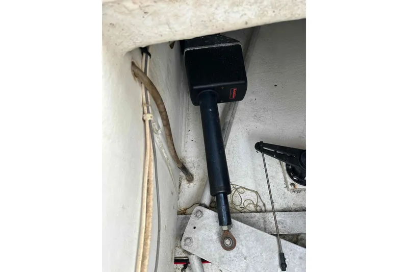 Slide: The Image of Hydraulic component inside 1998 Maine Cat Catamaran, showcasing mechanical details and wiring. - 76