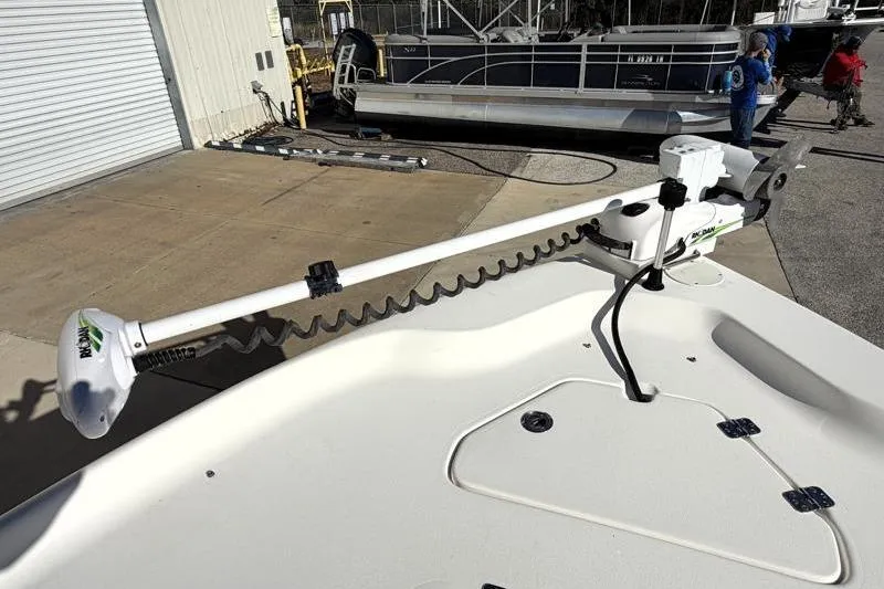 Slide: The Image of 2016 Key West 230 Bay Reef boat with trolling motor on deck. - 21