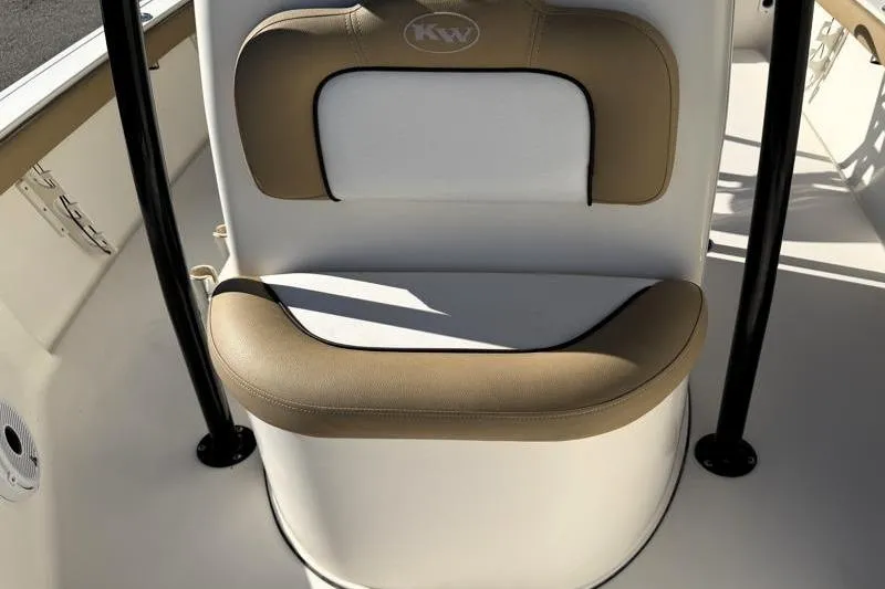 Slide: The Image of 2016 Key West 230 Bay Reef boat seat with tan and white upholstery. - 29