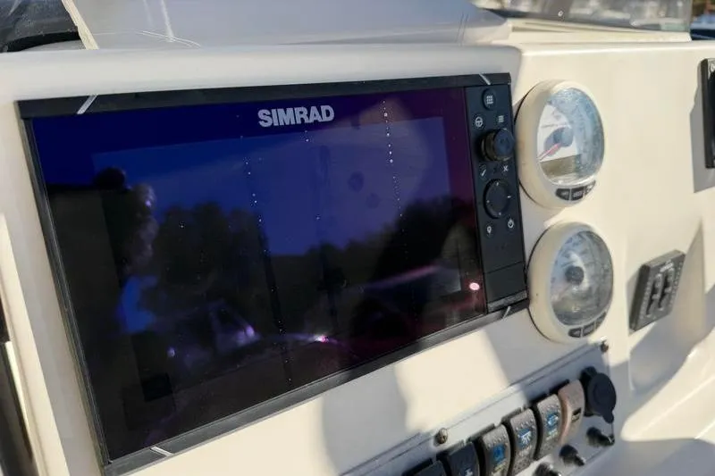 Slide: The Image of Simrad display on 2016 Key West 230 Bay Reef boat dashboard. - 38