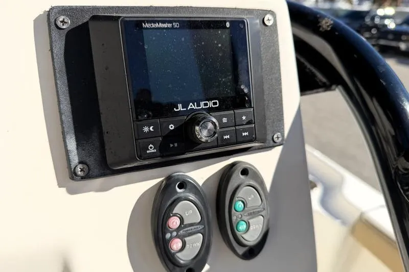 Slide: The Image of JL Audio MediaMaster 50 on 2016 Key West 230 Bay Reef boat dashboard. - 39