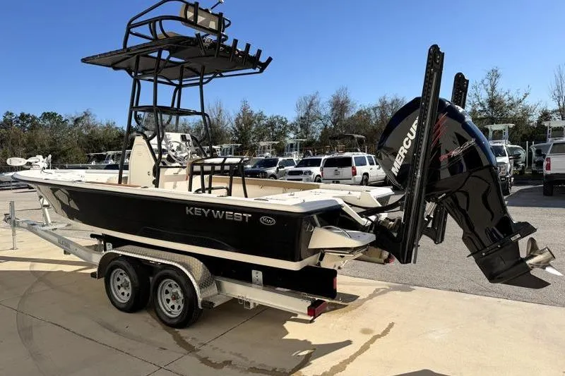 Slide: The Image of 2016 Key West 230 Bay Reef boat on trailer with Mercury outboard motor. - 5