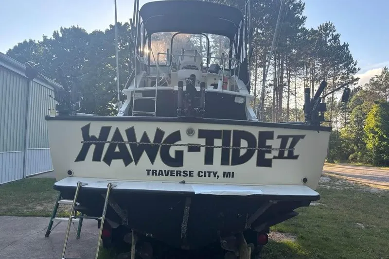 Slide: The Image of 1977 Bertram 28 Flybridge boat named "HAWG-TIDE II" in Traverse City, MI. - 6