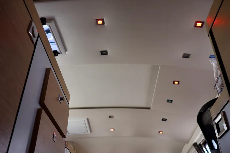Slide: The Image of Interior ceiling view of 2017 Outremer 51 catamaran with modern lighting. - 106