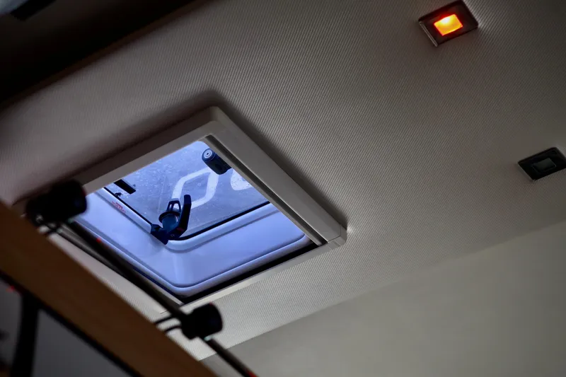 Slide: The Image of Ceiling hatch and light inside 2017 Outremer 51 yacht cabin. - 107