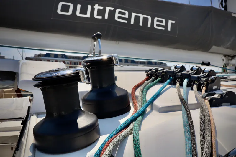 Slide: The Image of 2017 Outremer 51 sailboat deck with winches and colorful ropes. - 123