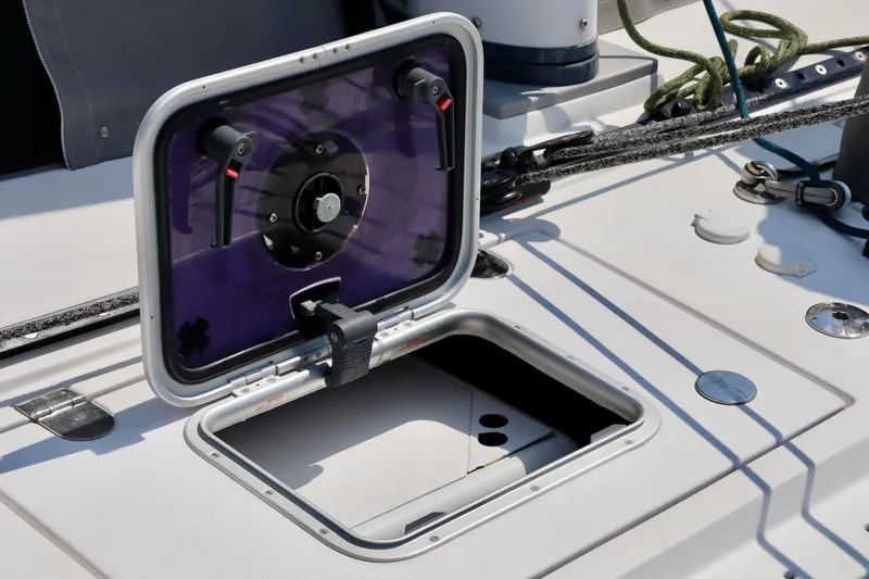 Slide: The Image of Open hatch on 2017 Outremer 51 sailboat deck, showing interior access. - 127