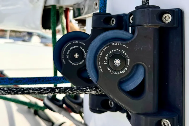 Slide: The Image of Pulley system on 2017 Outremer 51 sailboat, featuring marine equipment and ropes. - 19
