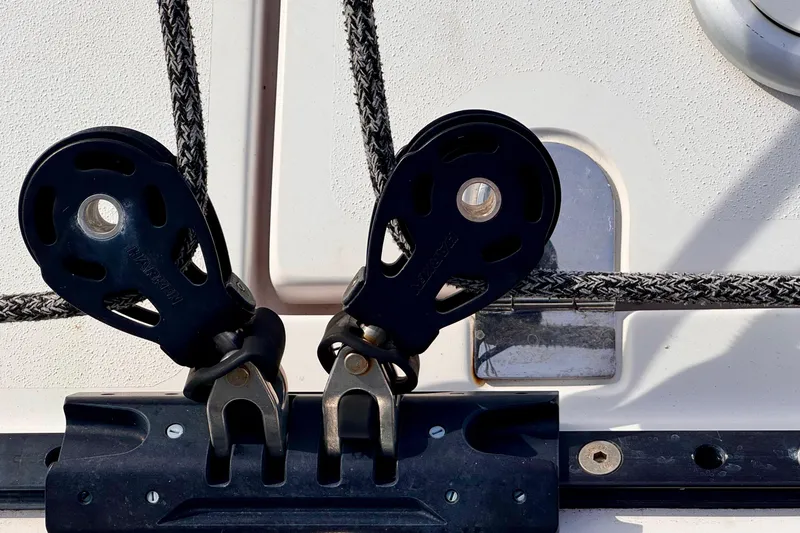 Slide: The Image of Close-up of 2017 Outremer 51 sailboat rigging and pulleys. - 30