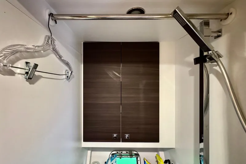 Slide: The Image of Interior of 2017 Outremer 51 yacht bathroom with shower and storage cabinet. - 34