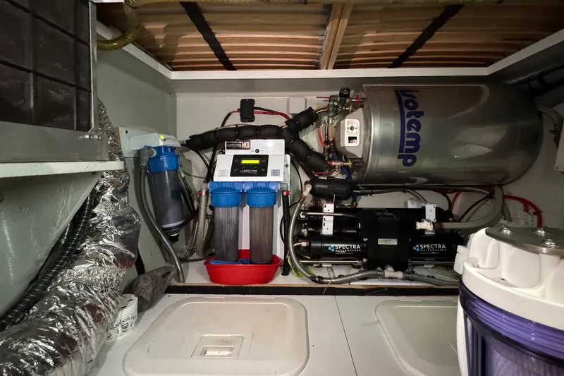 Slide: The Image of Engine room of a 2017 Outremer 51 yacht with water filtration system. - 58