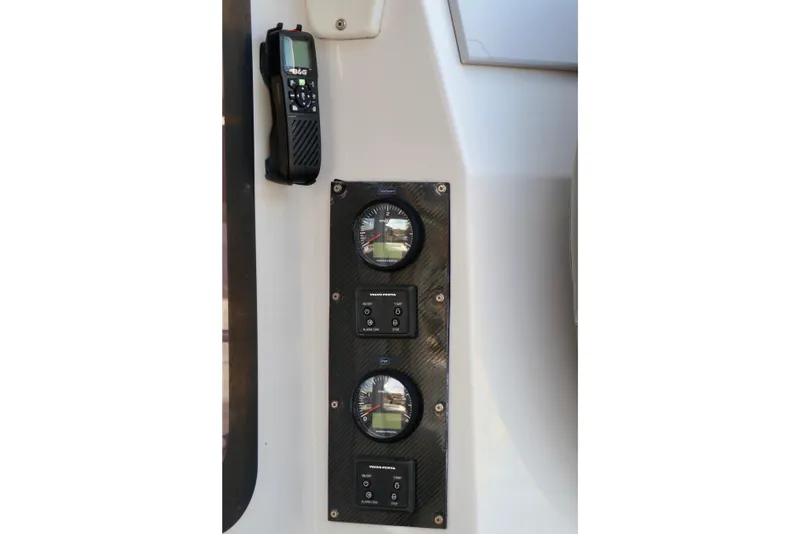 Slide: The Image of Control panel on 2017 Outremer 51 yacht with gauges and radio. - 87