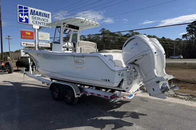 Slide: The Image of 2026 Sea Hunt Ultra 275 SE boat on trailer at Marine Service Center. - 3