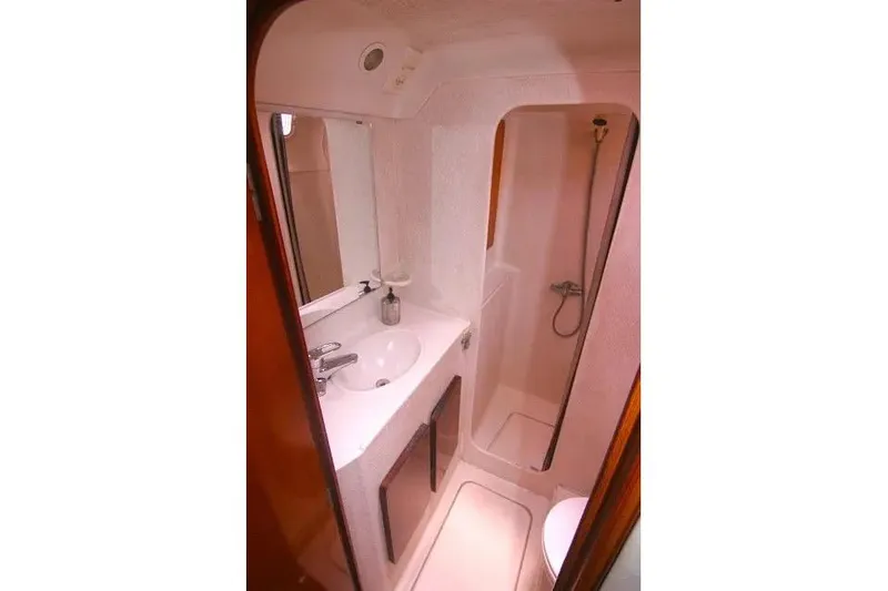 Slide: The Image of Compact bathroom in 1992 Privilege 482 yacht with sink and shower. - 13