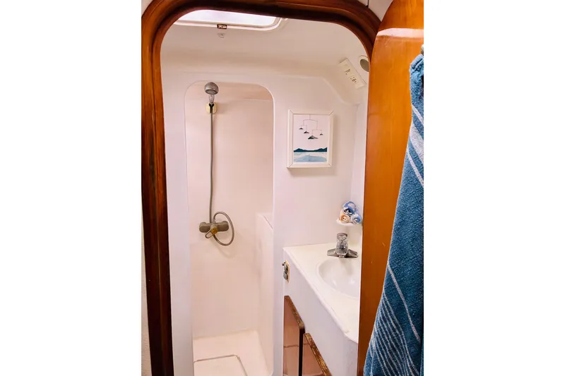Slide: The Image of Bathroom interior of 1992 Privilege 482 yacht with shower and sink. - 34