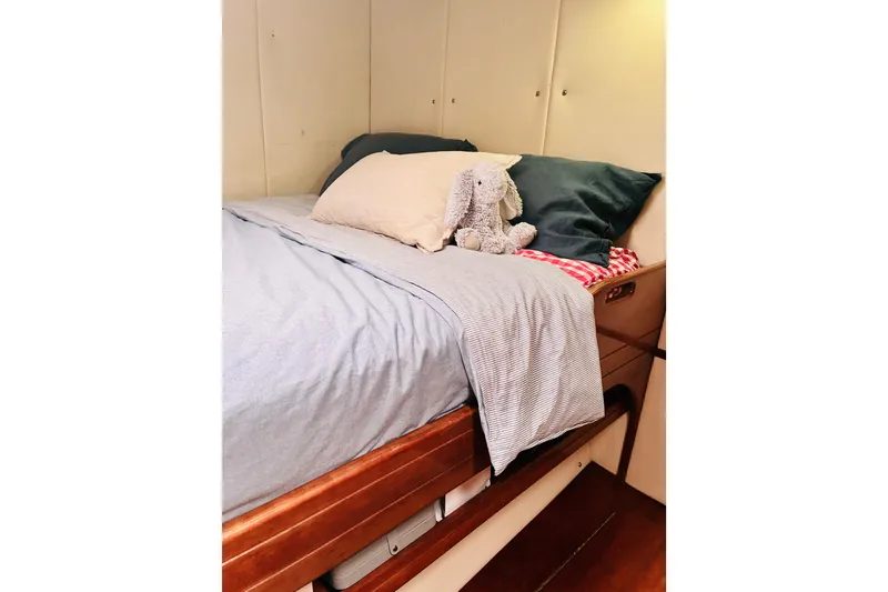 Slide: The Image of Cozy cabin bed with plush toy on Privilege 482 yacht, 1992 model. - 43