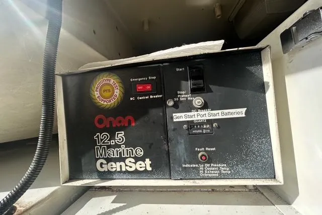 Slide: The Image of Onan 12.5 Marine GenSet control panel on 1995 Ocean 53 Super Sport yacht. - 26