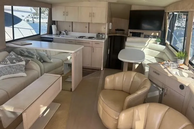 Slide: The Image of Luxurious interior of a 1995 Ocean 53 Super Sport yacht with modern furnishings. - 3