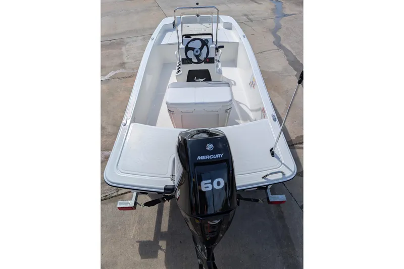 Slide: The Image of 2026 Mako Pro Skiff 17 CC with Mercury 60 engine, viewed from above. - 2