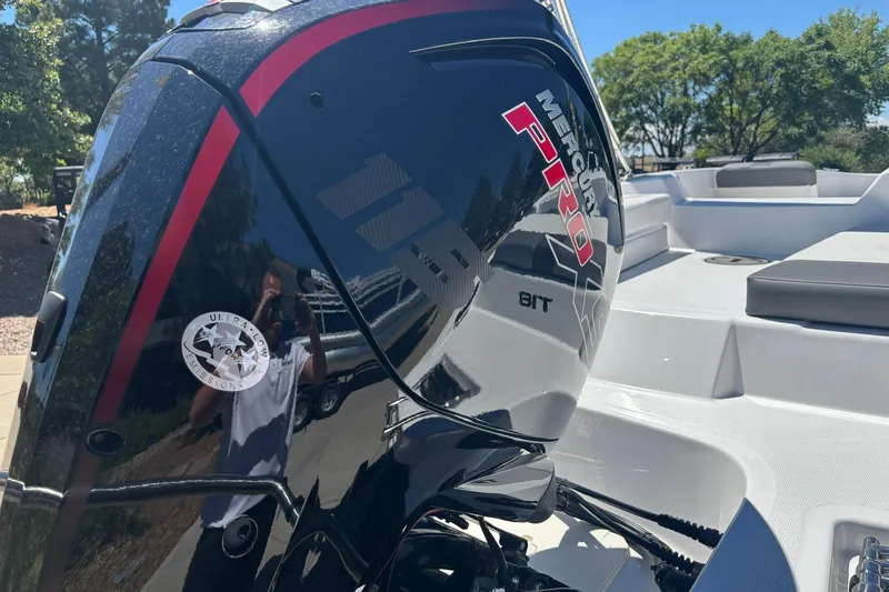 Slide: The Image of 2026 Tahoe T18 boat with Mercury Pro engine, featuring ultra-low emissions. - 14