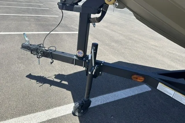 Slide: The Image of Trailer hitch of 2026 Tracker Grizzly 1756 T Marsh in parking lot. - 19