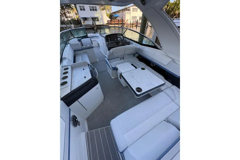Slide: The Image of 2024 Formula 310 Bowrider OB interior with luxurious seating and modern amenities. - 11