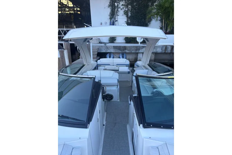 Slide: The Image of 2024 Formula 310 Bowrider OB boat interior with spacious seating and sleek design. - 15