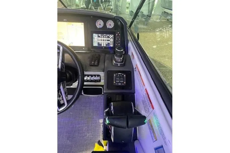 Slide: The Image of 2024 Formula 310 Bowrider OB dashboard with modern controls and navigation displays. - 20