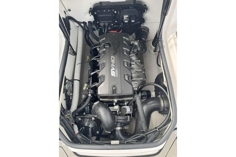Slide: The Image of 2024 Yamaha Boats 195S engine compartment showcasing powerful SVHO engine. - 22