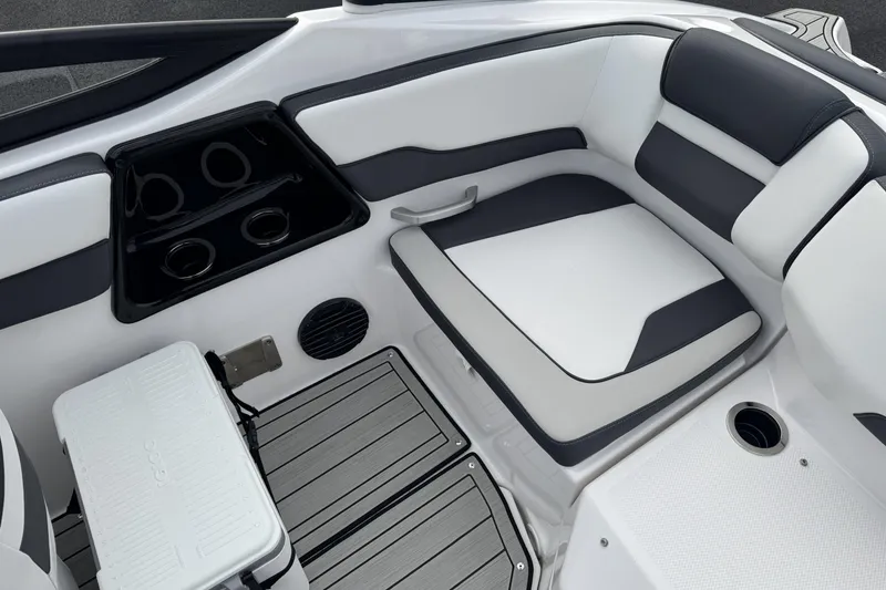 Slide: The Image of 2024 Yamaha Boats 195S interior with cushioned seating and cup holders. - 23