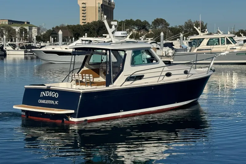 Slide: The Image of 2005 Back Cove 29 boat named Indigo in Charleston marina. - 11