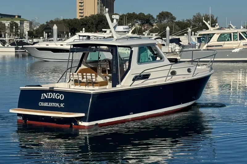 Slide: The Image of 2005 Back Cove 29 boat named Indigo in Charleston marina. - 12