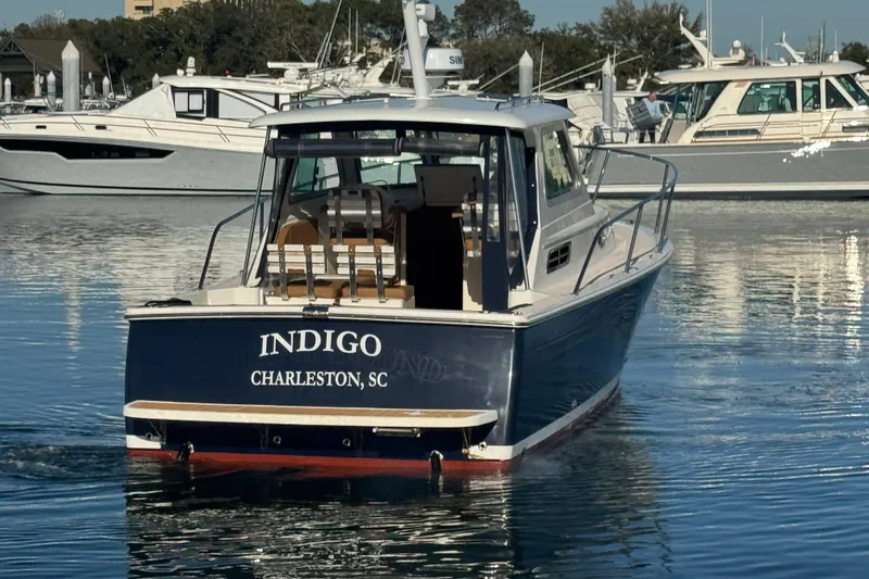Slide: The Image of 2005 Back Cove 29 boat named Indigo in Charleston marina. - 13