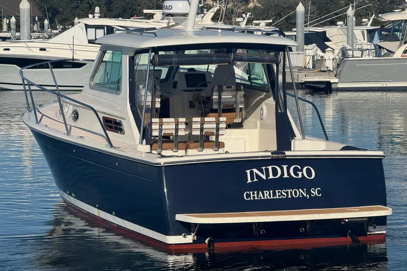Slide: The Image of 2005 Back Cove 29 boat named Indigo docked in Charleston, SC marina. - 15