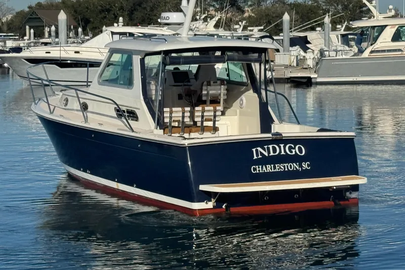 Slide: The Image of 2005 Back Cove 29 boat named Indigo docked in Charleston, SC marina. - 16