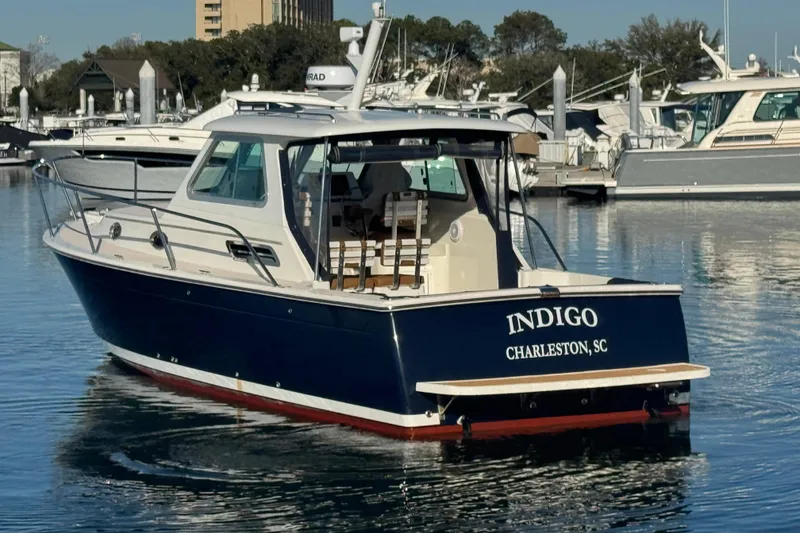 Slide: The Image of 2005 Back Cove 29 boat named Indigo docked in Charleston, SC marina. - 17