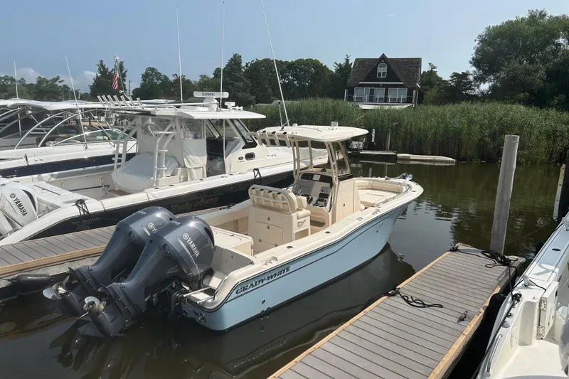 The Image of 2023 Grady-White Fisherman 257 boat docked with twin Yamaha engines. - 0