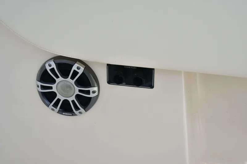 Slide: The Image of Speaker and control panel on 2023 Grady-White Fisherman 257 boat interior. - 13