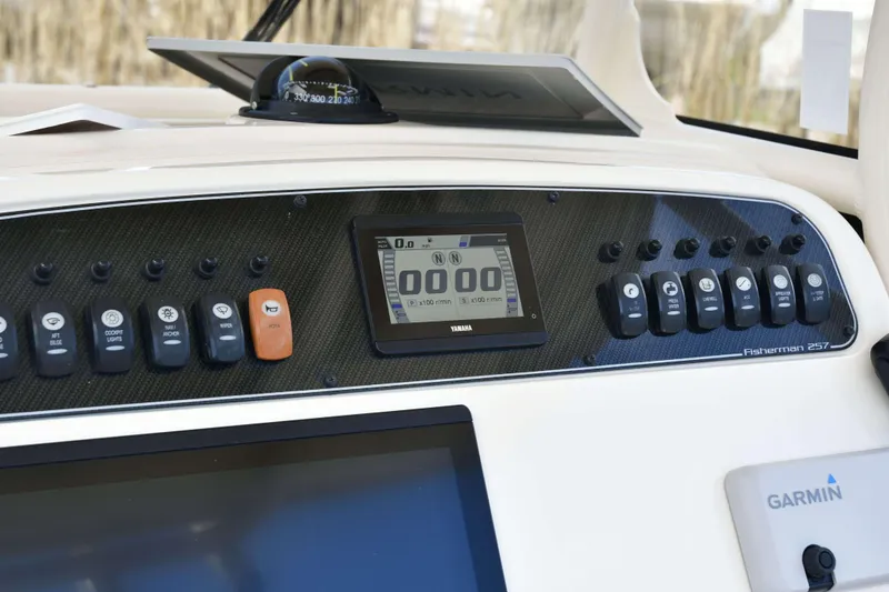 Slide: The Image of Dashboard of 2023 Grady-White Fisherman 257 boat with Yamaha display and controls. - 18